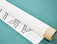 紙管に印字面を内巻きにする